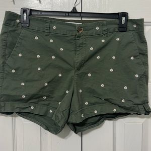 Army green shorts with daisies